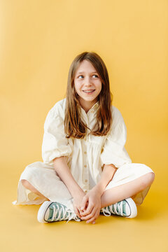 Young girl with observant, positive expression portrait
