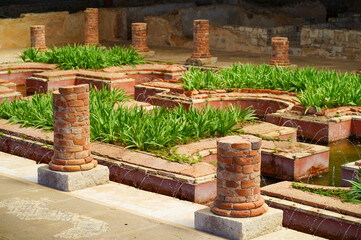 famous Roman ruins bath fountain house in Conimbriga, Portugal