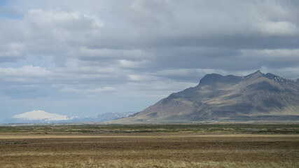 Naklejka premium Icelandic landscape with mountains, fjord and clouds. Snaefellsnaes peninsula
