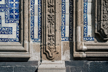 Detail of ornated wall with blue tiles