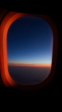 Sunset View From A Plane Window 