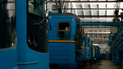 Metro trains are lined up at the metro depot. Repair and serviceability check.