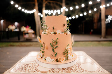 Two-Tier Wedding Cake With Floral Decor
