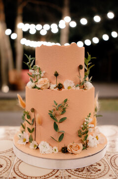 Peach Wedding Cake With Floral Decor