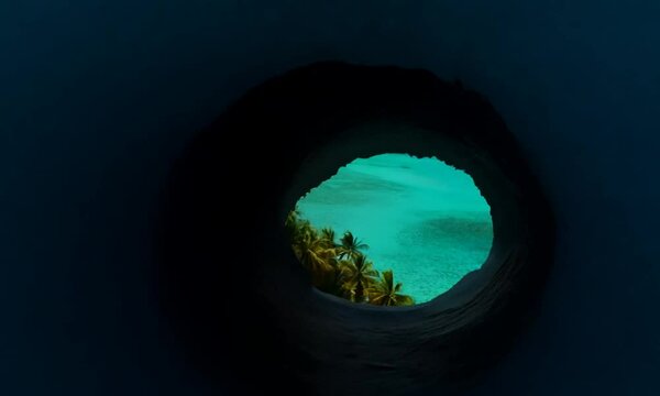 Continuous hyperspeed FPV footage: The camera seamlessly flies through a Antarctic ravine to the caribbean