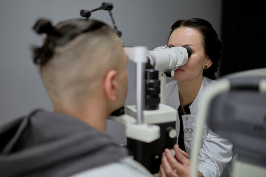 A doctor and a patient in an ophthalmology clinic