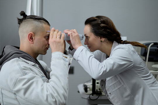 A doctor and a patient in an ophthalmology clinic