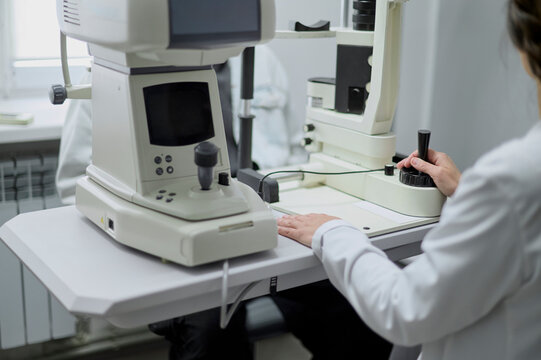 A doctor and a patient in an ophthalmology clinic