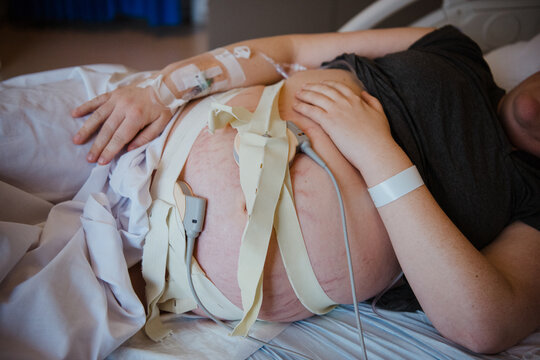 pregnant belly with monitoring devices