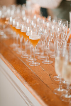 Elegant glasses on a wooden bar counter