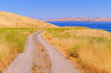 A trail path near the lake located in the central California USA