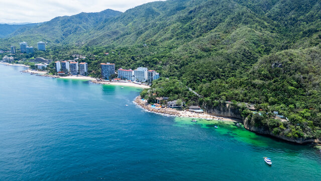Aerial View from the Sea towards Paredon Beach and Las Gemelas Beach. Puerto Vallarta, Jalisco. Mexico