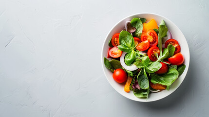 Fresh Organic Mixed Salad with Colorful Tomatoes on White Plate