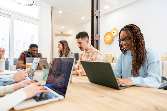 Businesspeople having online meeting in office
