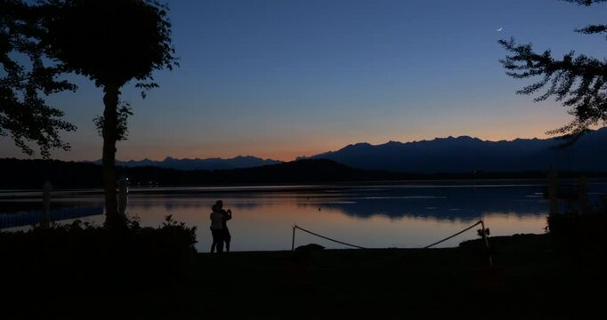 Silhouette Viverone's lake at sunset. Video 4K