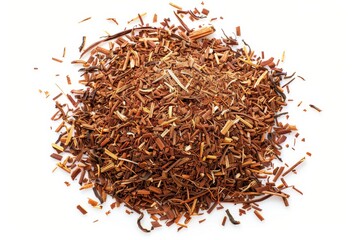 Fototapeta premium Pile of rooibos tea from above on white background