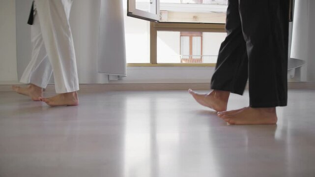 Walking On Barefoot Heels At Karate School