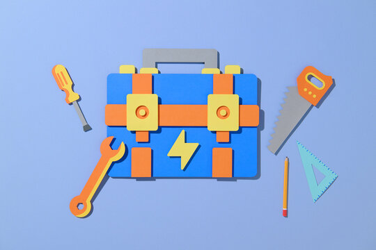 Happy Labor Day with tools and ties on a beige background