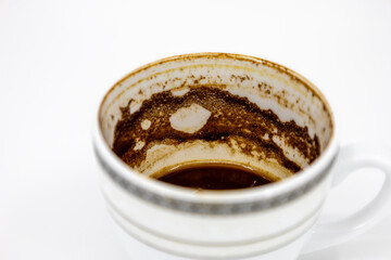 Close-Up of Coffee Cup with Residue and Coffee Stains
