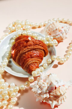 croissant on a small round plate