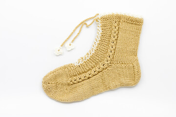 Hand-Knitted Beige Woolen Sock with Floral Detail and Lacing