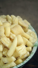 Singkong rebus or boiled cassava is a traditional Indonesian meal made from steamed cassava. Focus selected