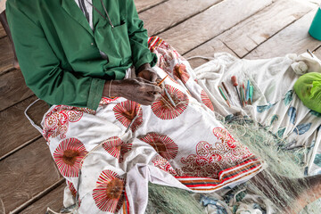 Traditional net mending in senegal