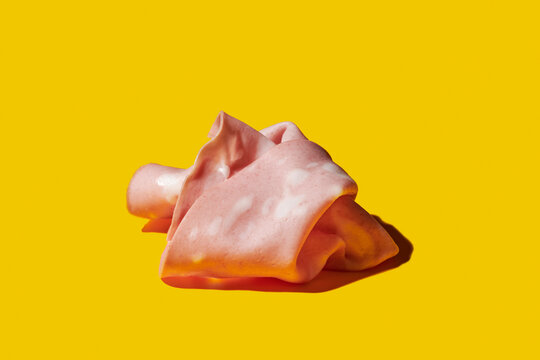 crumpled slice of italian mortadella