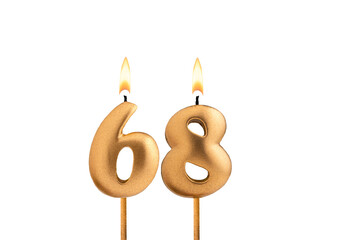 Golden candle number 68 - Birthday on white background