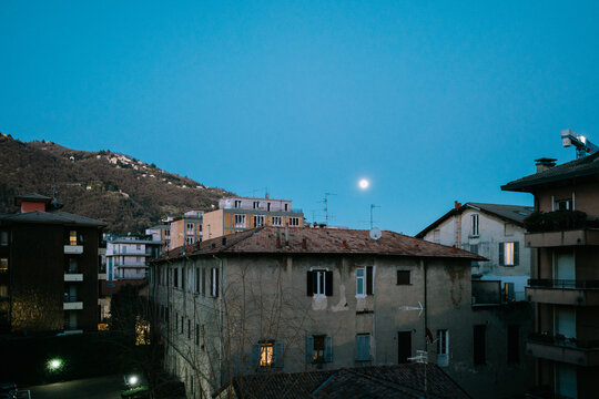 Twilight Moon Over Como Buildings