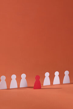 White paper human figures following red one. Leadership concept.