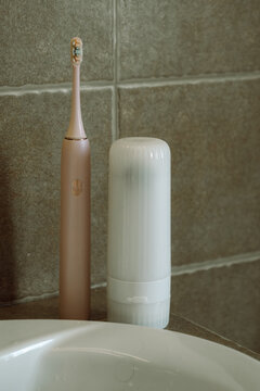 Toothbrush and dental flosser