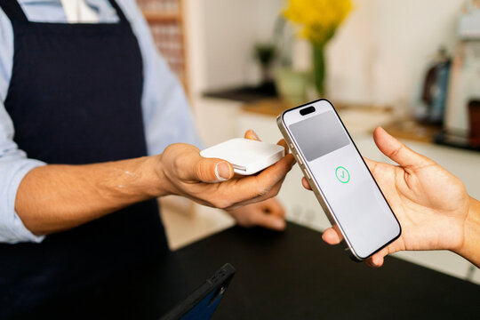 Close-Up Phone Payment Process at shop