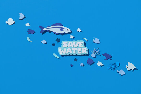 animals under the sea in the paper cutting with text Save Water