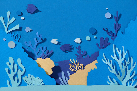 Paper cut sea background. Underwater ocean coral reef with waves