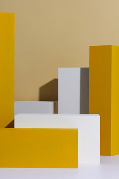 Yellow and white podium for products display