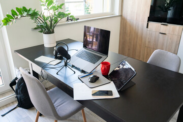 Computer And Microphone On The Table