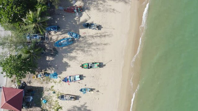 Aerial view of clear blue turquoise seawater, Andaman sea in Phuket island in summer season, Thailand. Water in ocean pattern texture wallpaper background.