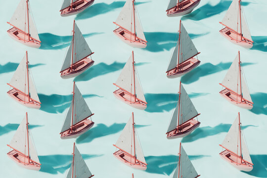 Pattern of Sailboats on Clear Blue Water