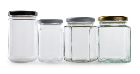 Many empty glass jars isolated on white