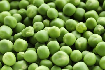 Fresh green peas as background, closeup view