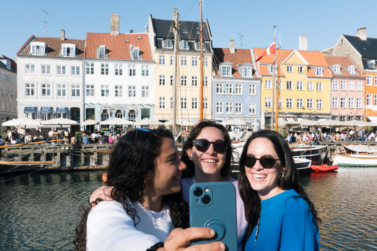 friends enjoy and take a selfie in copenhagen