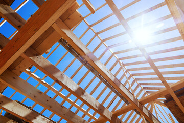 Building wooden roof beams using truss frames with beams, rafters, joists