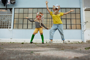 woman and boy in diy monster mask  