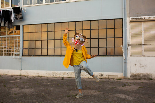 woman in diy monster mask  