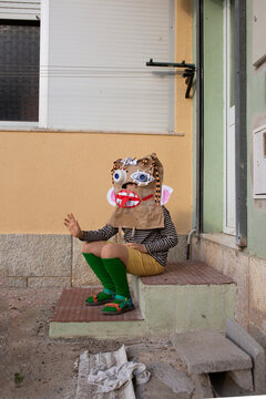 boy in diy monster mask  