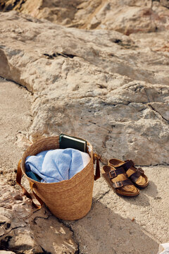Beach bag with personal belongings