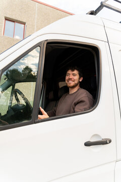 Delivery man working with his van
