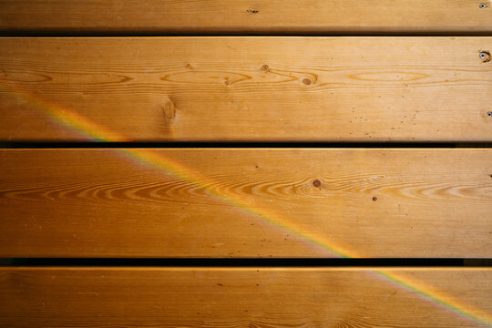 Rainbow On Wooden Planks - Powered by Adobe