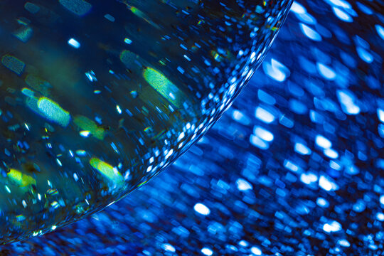 An abstraction with a shiny moving sphere and streams of energy